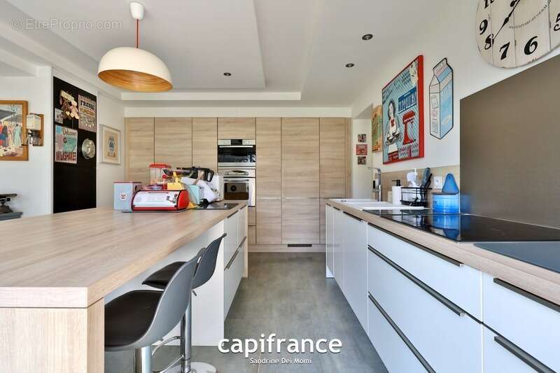 Maison à TASSIN-LA-DEMI-LUNE