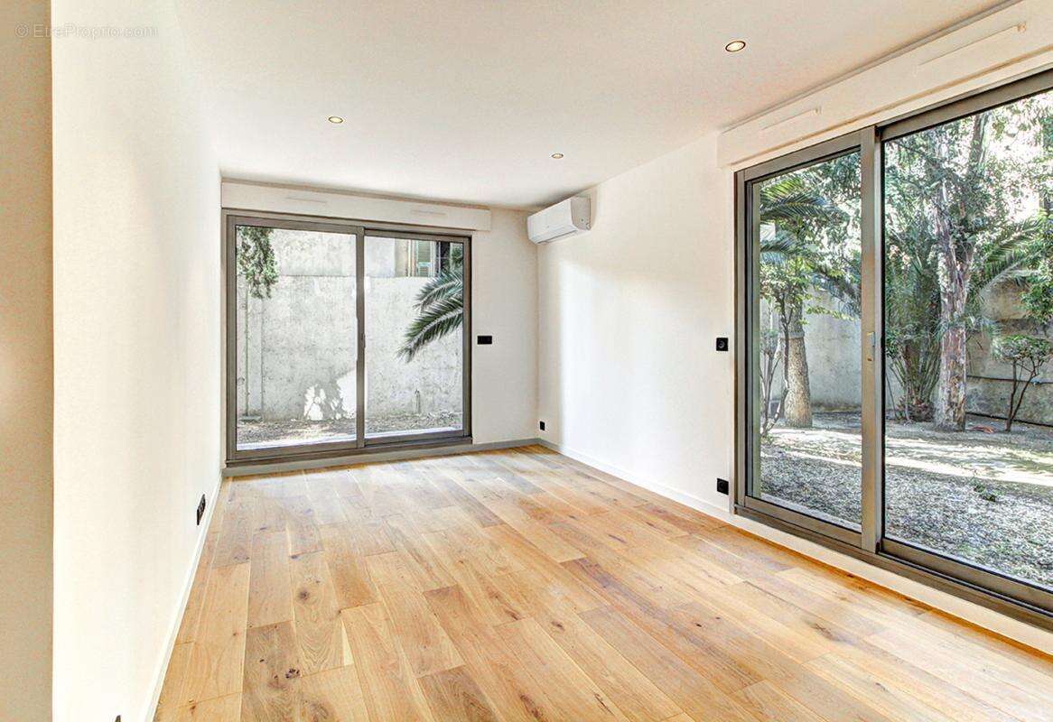 Appartement 4 pieces renove en rez de jardin - photo 2