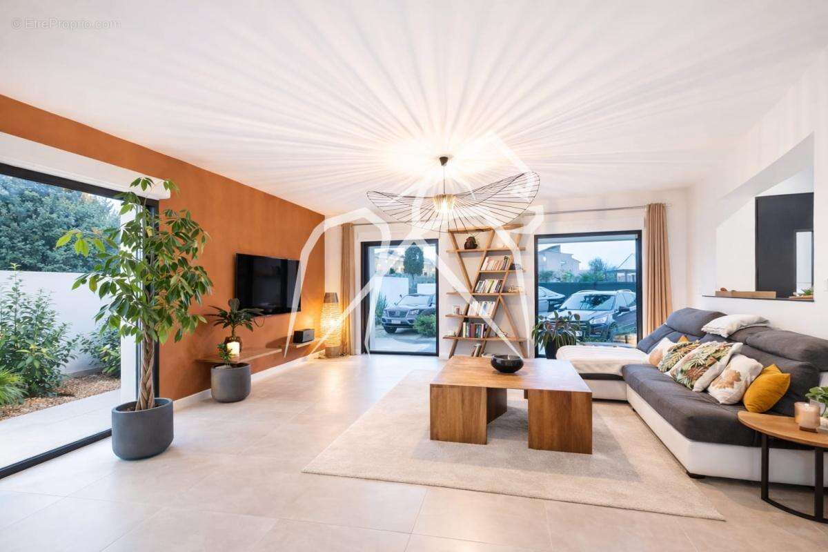 Villa contemporaine de plain-pied  5 Pièces  3 chambres  Lattes (34970) - photo 6