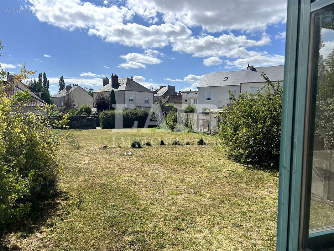Maison de bourg en pierre, sur sous-sol  complet et jardin, Rânes. Réf : E15541 - photo 10