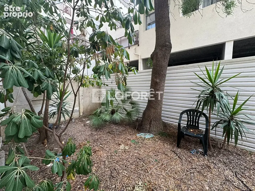 Appartement T2 rez-de-jardin centre ville - photo 8