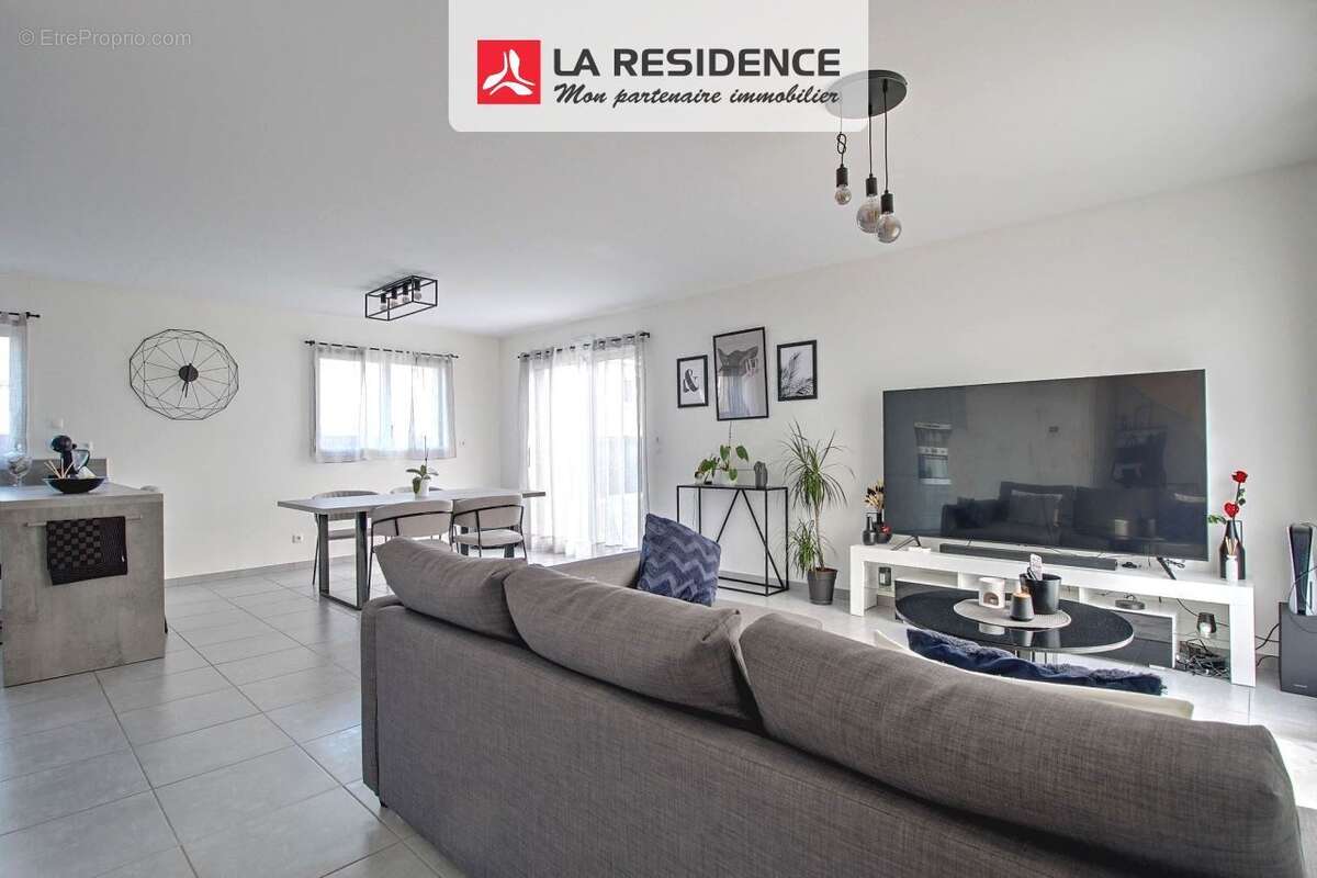 Maison 117 m² à Saint-Etienne-Du-Rouvray  - photo 2