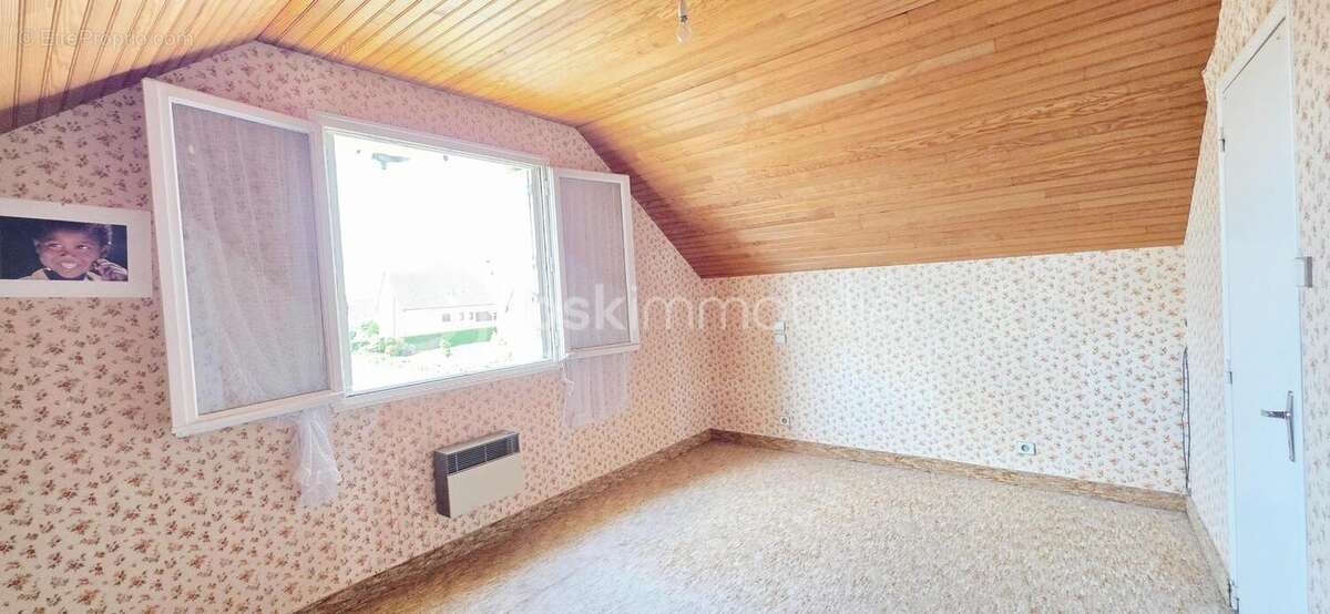 Maison avec jardin : Le parfait compromis entre confort et potentiel ! - photo 8