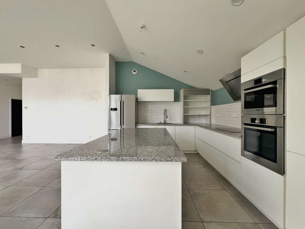 Maison Loft à vendre à Reims, bien atypique avec volumes et cachet - photo 4