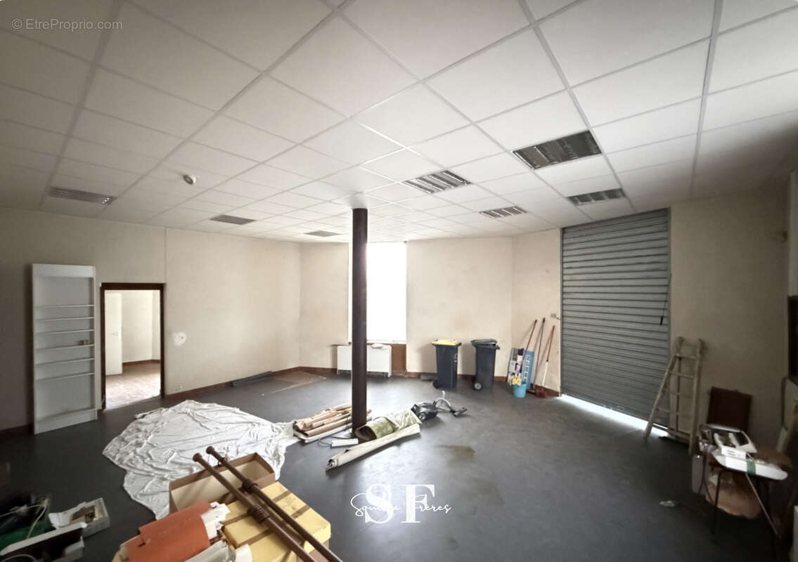 Rive gauche, immeuble de caractere appartement et local commercial - photo 12