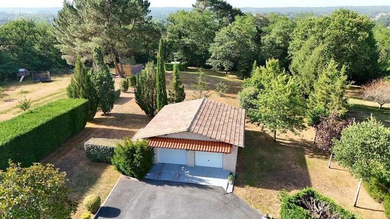 Plain-pied 148 m², DPE A sur 3 700 m² de terrain – Géothermie, double garage et jardin clos - photo 12