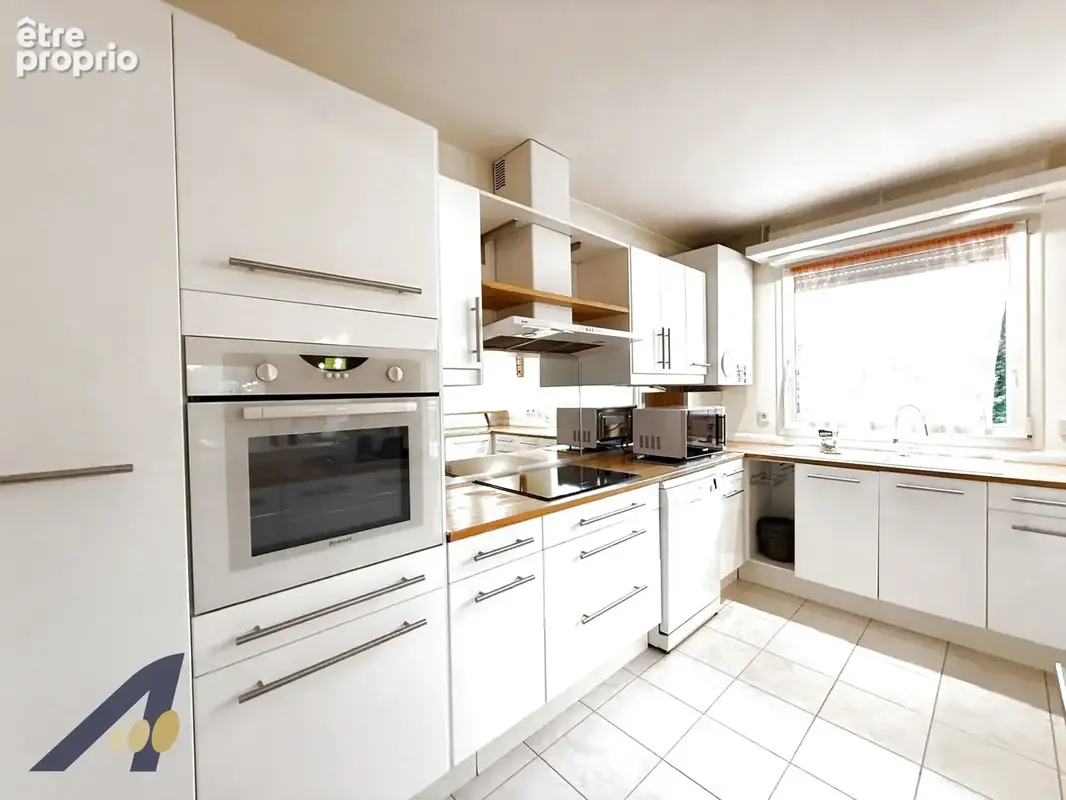 Rare a la vente-superbe duplex de 123m2 au coeur d'un parc arbore-terrasse-garages - photo 2