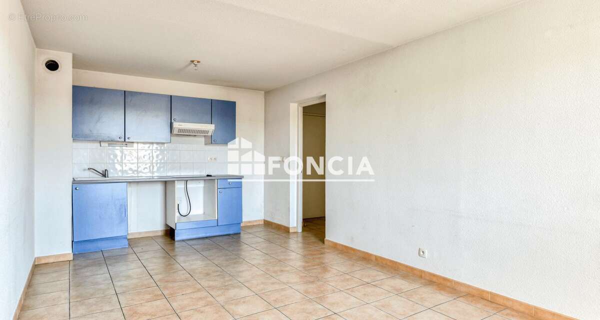 Appartement T3 avec place de parking - photo 2