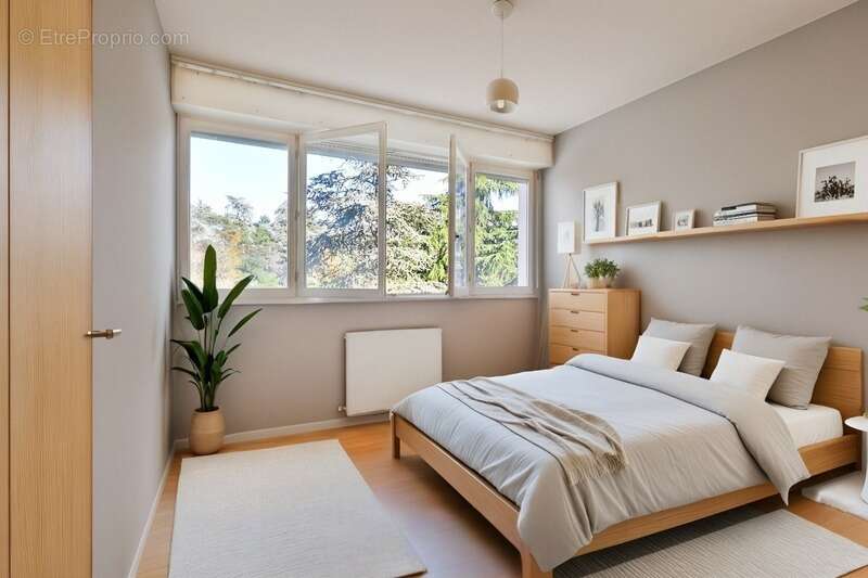 SAINTE FOY LES LYON - Bd de l'Europe- Appartement T3 de 68m² avec balcon, place de stationnement extérieure et cave - photo 10