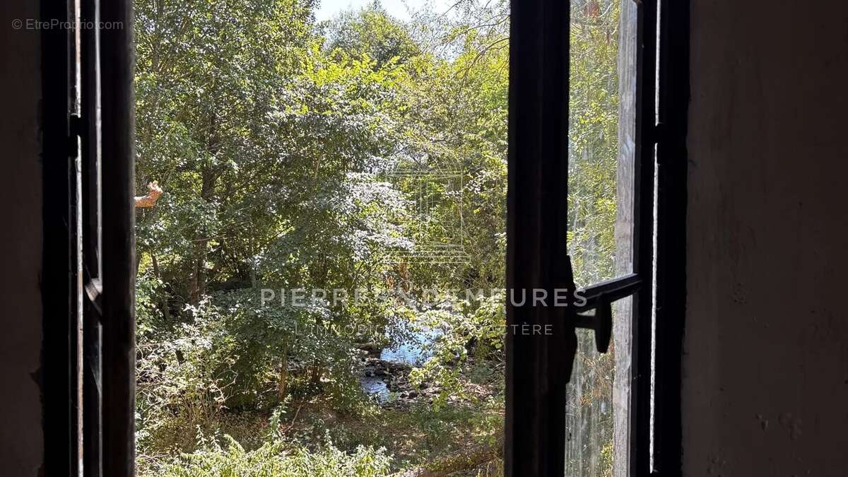 Ancien moulin a renover avec jardinet - photo 16