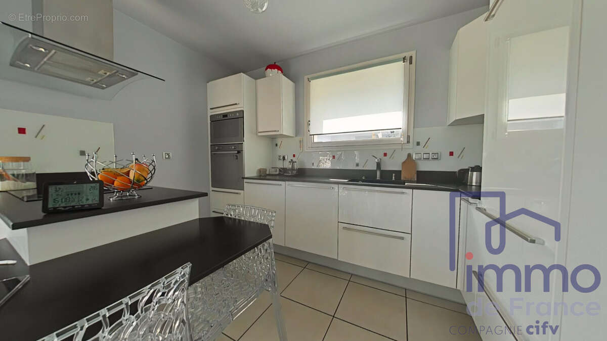 Maison 88 m² à Saint-Jean-Bonnefonds  - photo 4