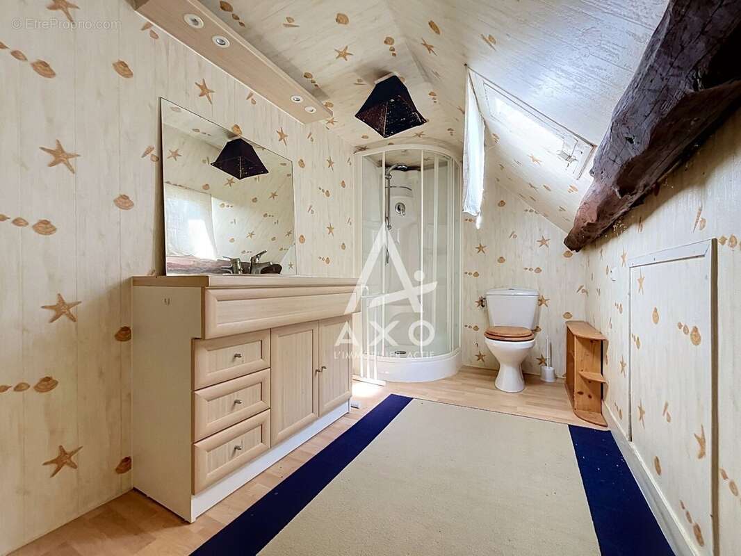 Maison centre bourg de nevoy - photo 7