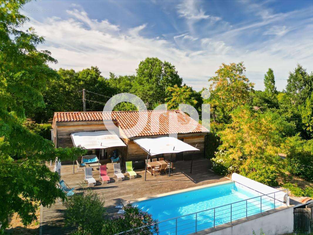 Villa en bois avec piscine - photo 17