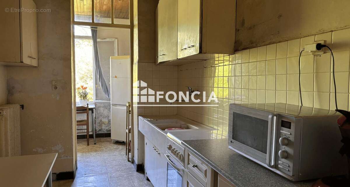 Montpellier Arceaux — Maison de caractère 90 m², jardin arboré, garage et vrai projet de vie à bâtir - photo 4
