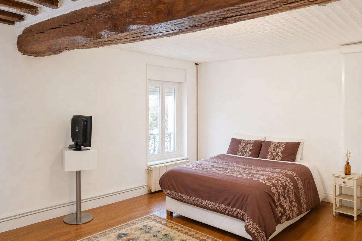 Maison de 55 m² à rénover avec jardin – toutes commodités à pied - photo 10