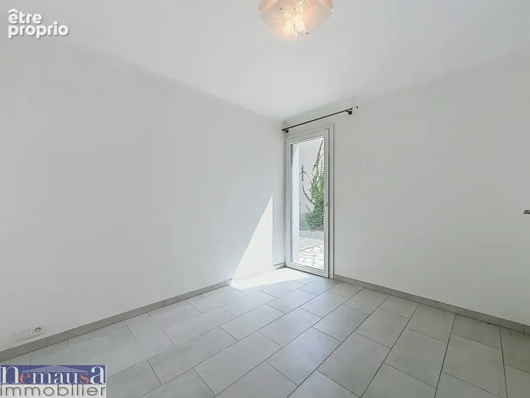A vendre Maison de plain-pied rénovée avec jardin   Nîmes Saint-Césaire - photo 9