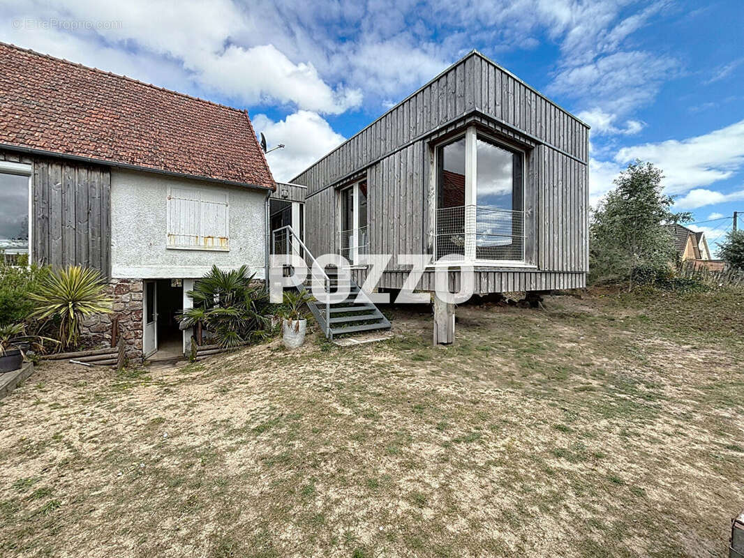 Maison à AGON-COUTAINVILLE