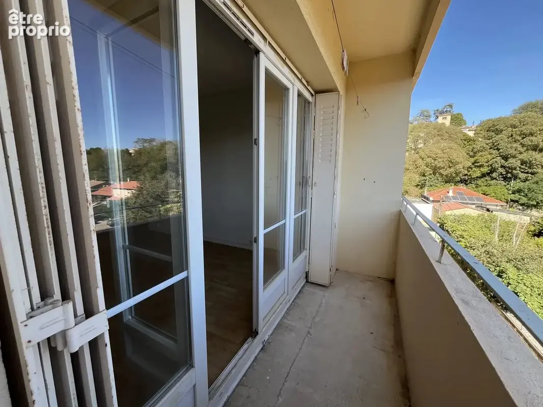 VALENCE - Appartement T3 loué avec balcons, cave et parking - photo 11