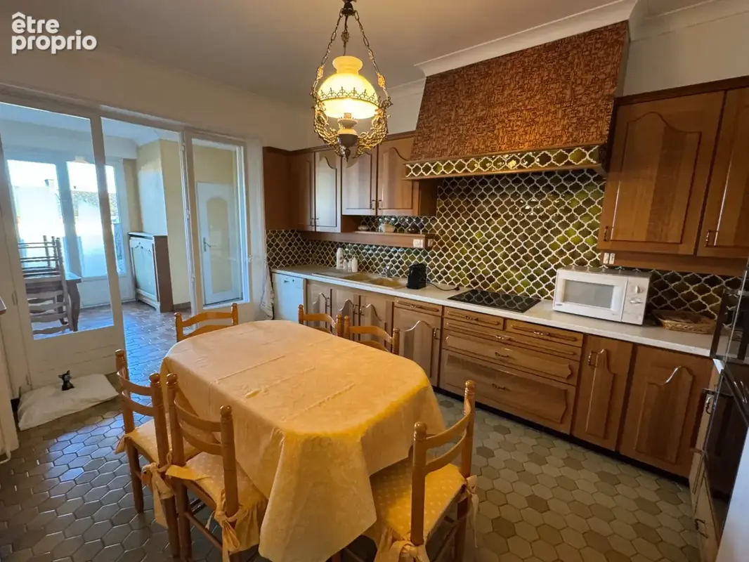  Élégante maison semi-individuelle – Centre-ville de Fourmies – 159 m² – Jardin arboré – Garage 45 m² - photo 12