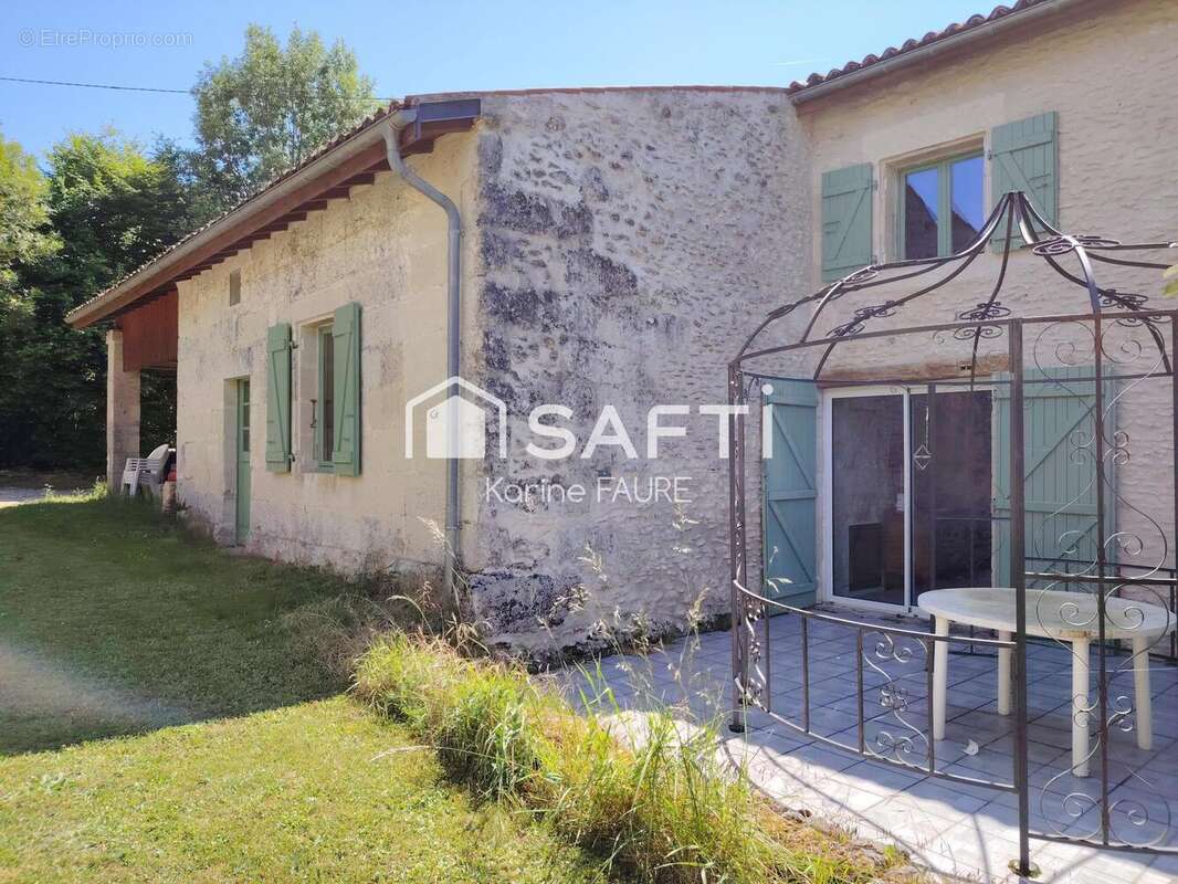 Photo 4 - Maison à LA CHAPELLE-DES-POTS