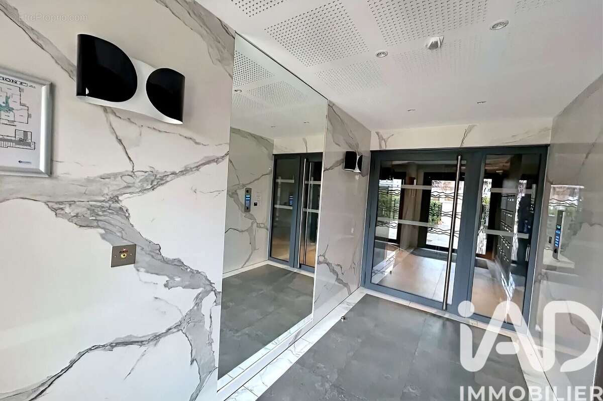 Photo 7 - Appartement à VOISINS-LE-BRETONNEUX