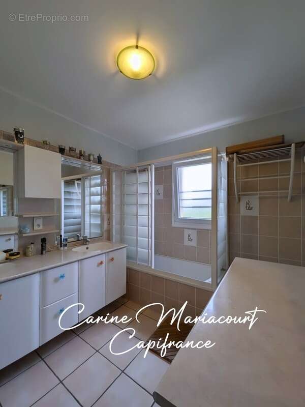 Maison de plain-pied 127 m² 4 chambres - photo 5