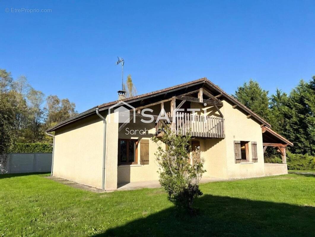 Photo 1 - Maison à LE TUZAN