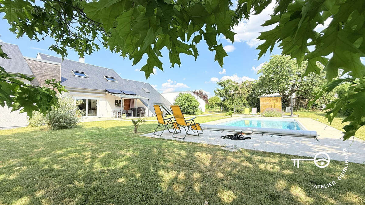 Maison d'architecte ! Volumes, fonctionnalité et environnement calme à Mardié !! - photo 6