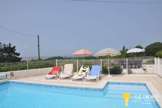 Maison de plain pied avec 4 chambres piscine et belle vue sur l'estuaire de la Gironde. - photo 6