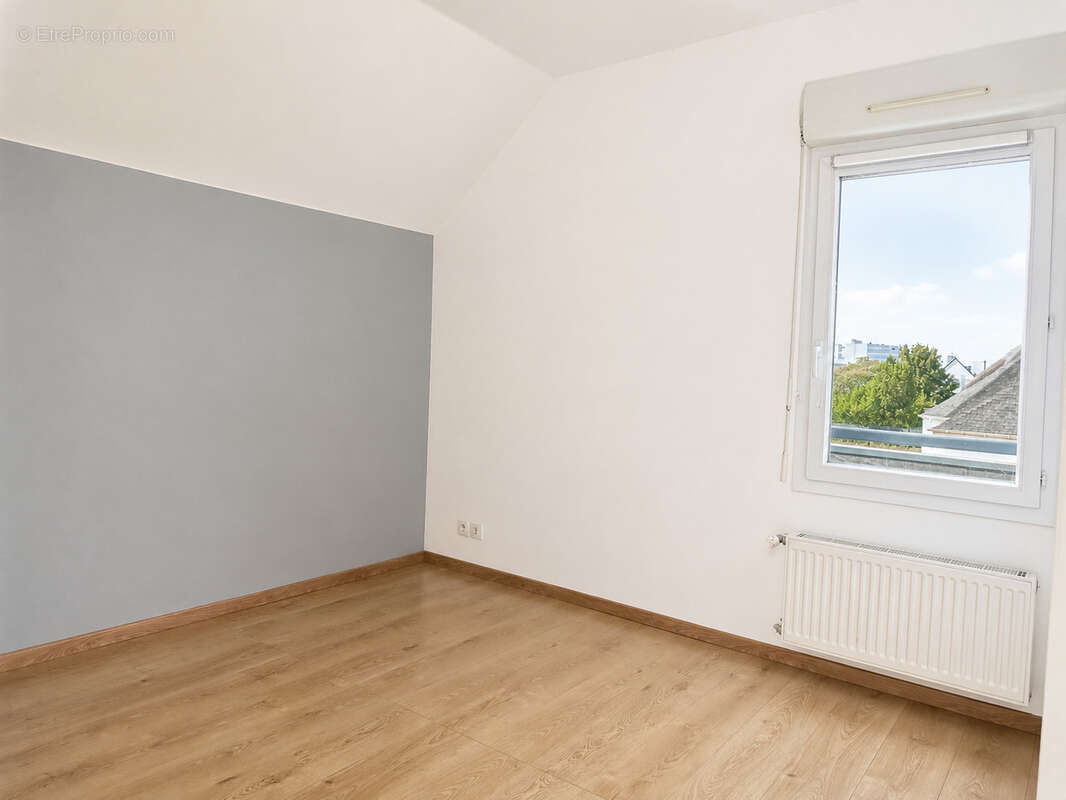 Maison familiale de 125m2 - 4 chambres - quartier certé à trignac - photo 8