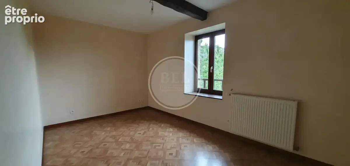 Maison 4 pièces 89 m² à vendre à Saint-Genis-L'argentiere (69610) - photo 7