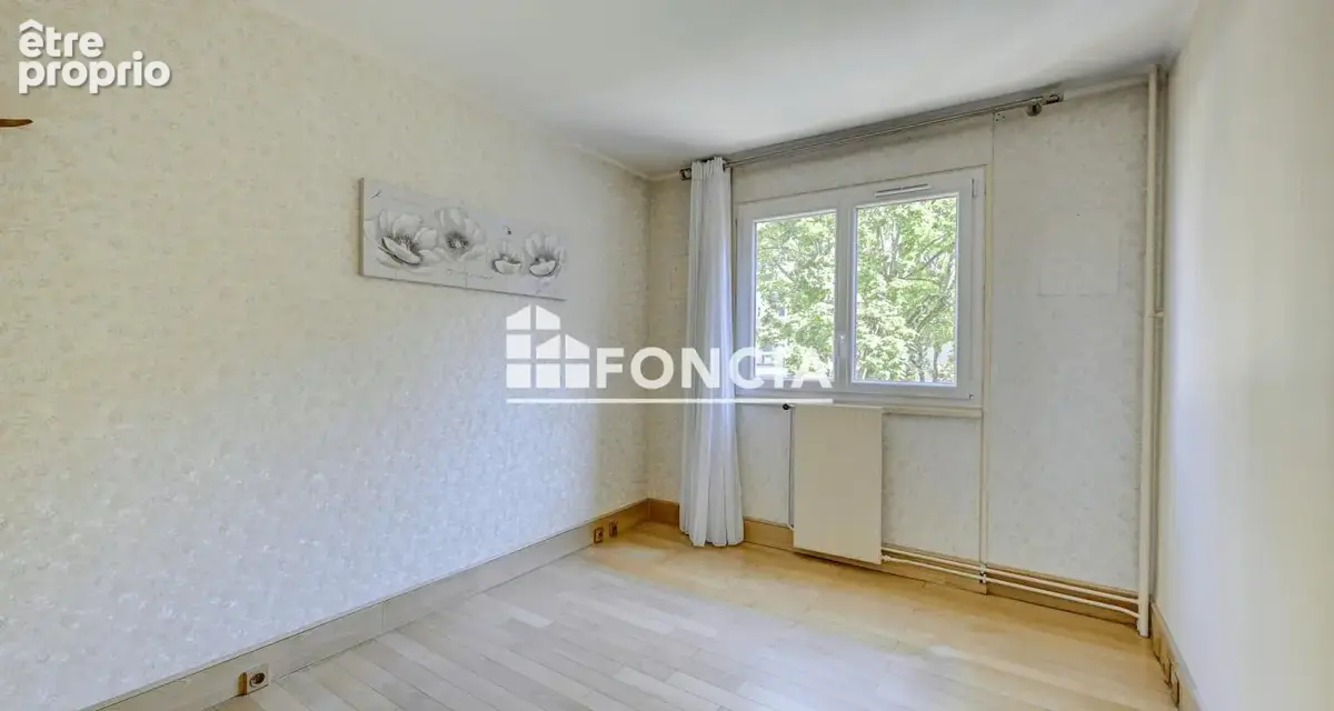 Appartement familial avec balcon ,cave et parking - photo 5