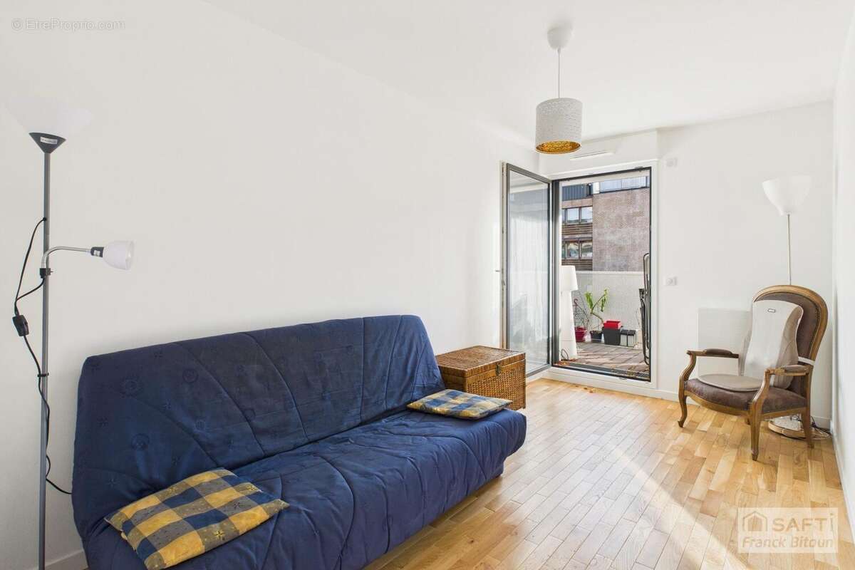 Photo 8 - Appartement à COURBEVOIE