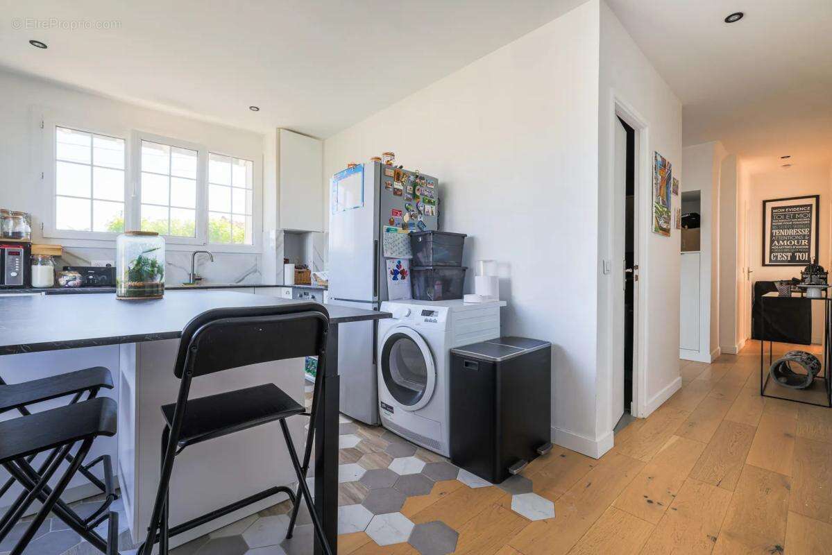 Appartement familial 4 pièces avec jardin privatif - photo 5