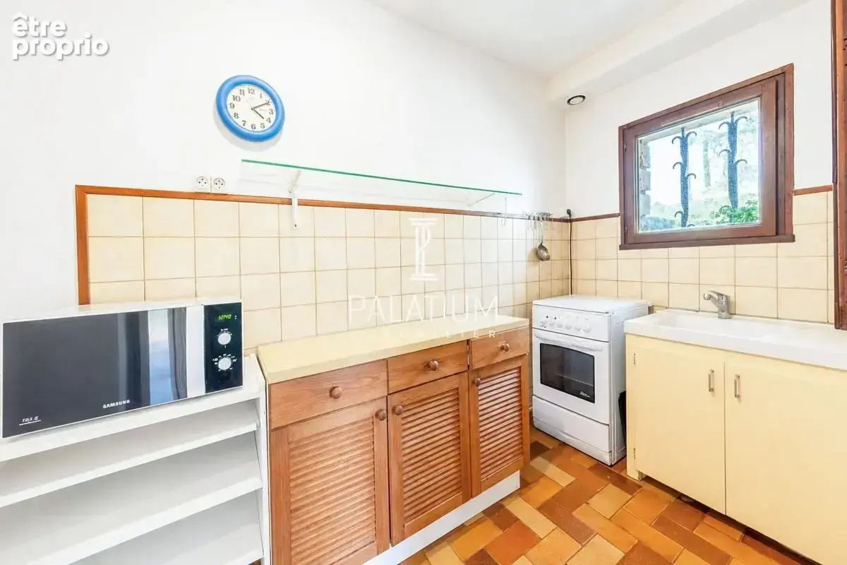 Maison de plain-pied avec jardin arboré et 3 appartements - photo 22