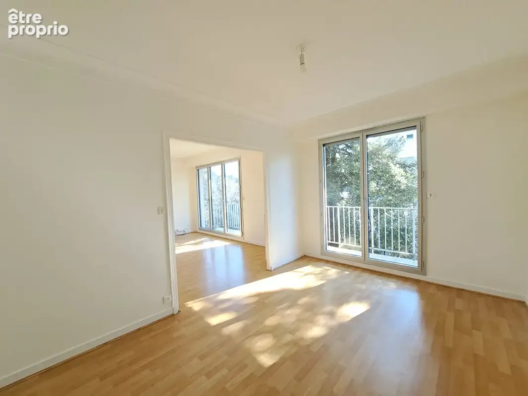 Spacieux appartement T4 de 100,97 m² avec balcon, cave et parking - photo 5