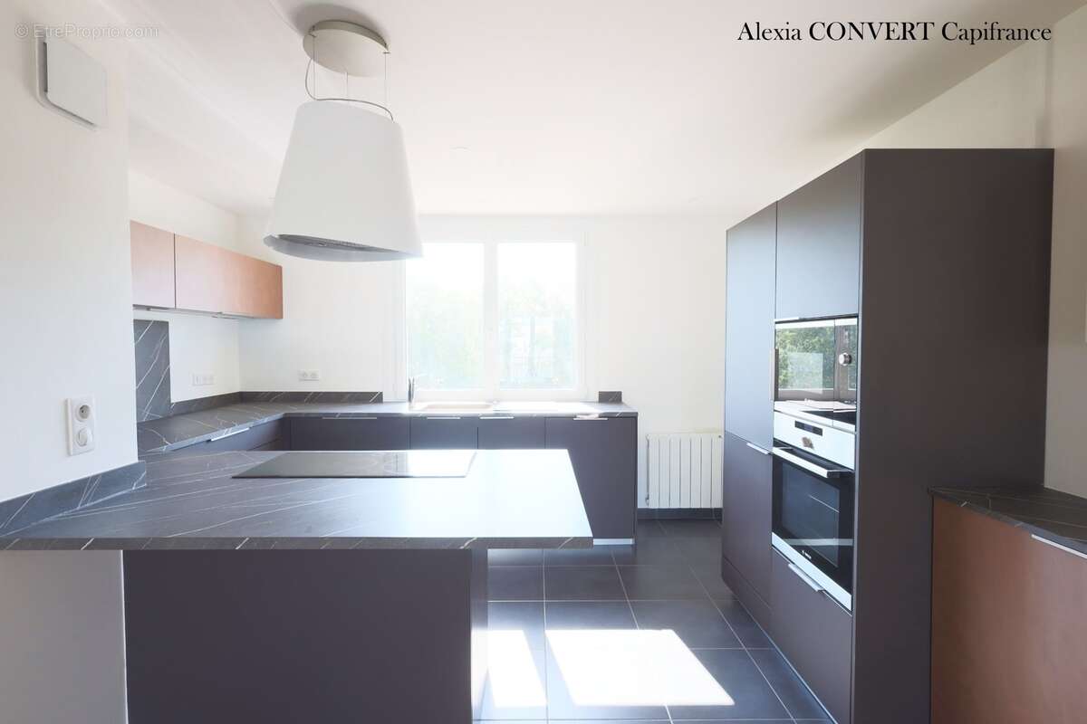 Appartement d'exception 99m² avec garage vue panoramique à SAINT LAURENT SUR SAONE (01) - photo 2