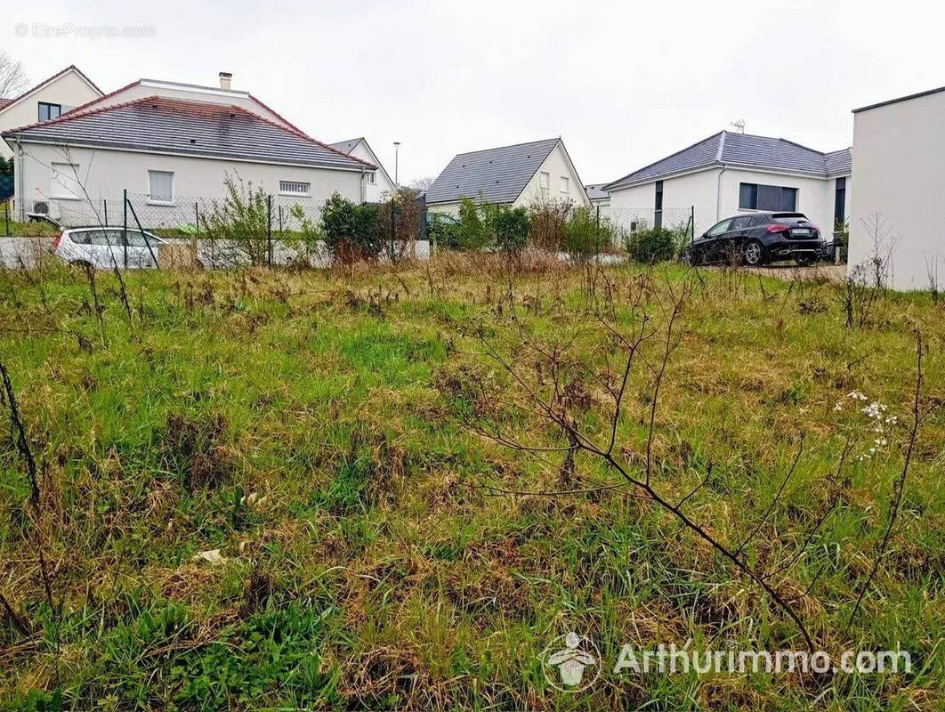 Terrain à POUILLEY-LES-VIGNES