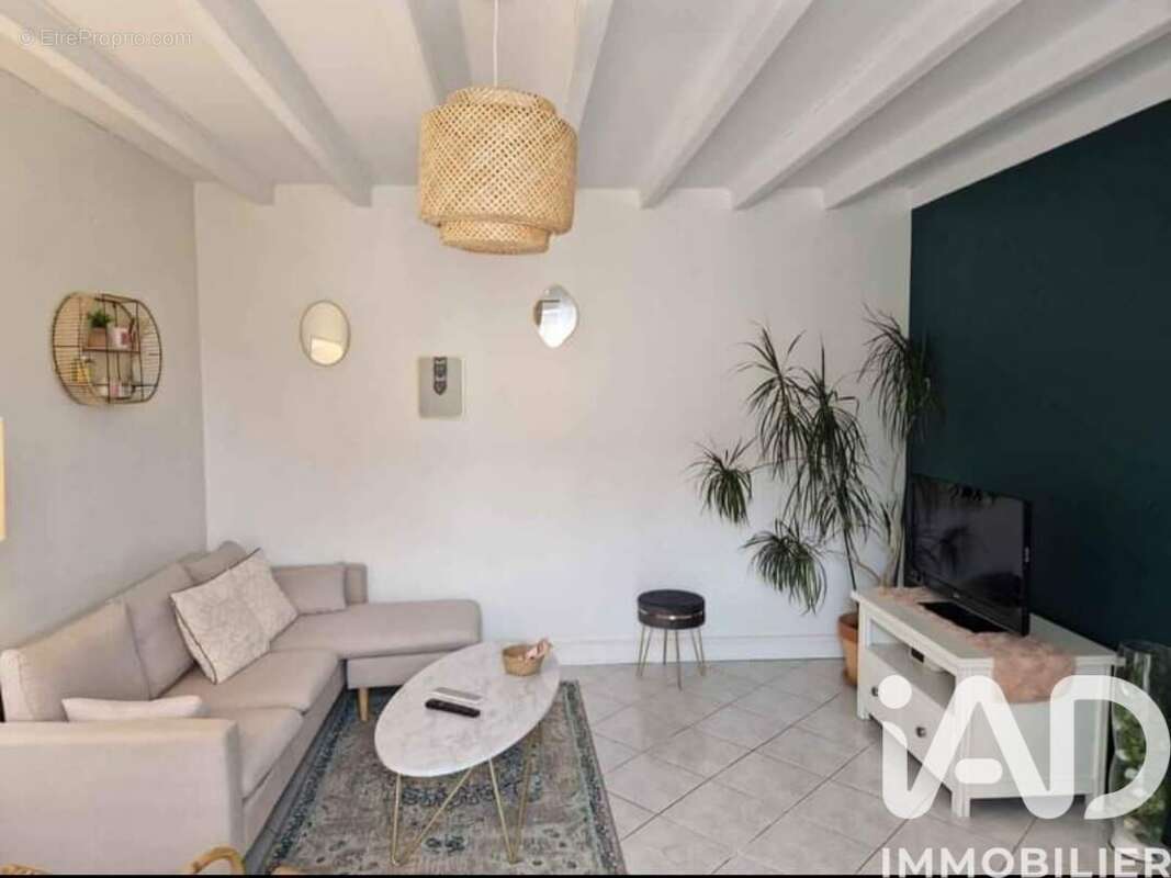 Photo 2 - Maison à ROCHES-PREMARIE-ANDILLE