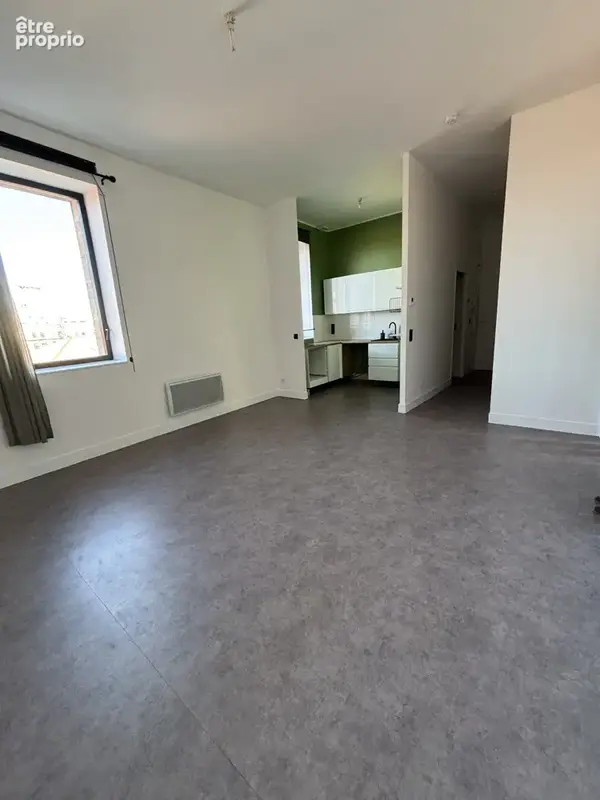 T3 lumineux dans immeuble en pierre avec parking - photo 4