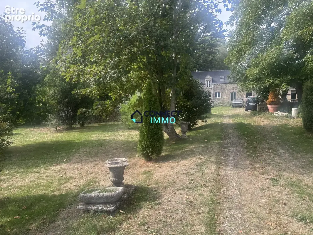 Maison 10 pièces 280 m² à vendre à Gourin (56110) - photo 2