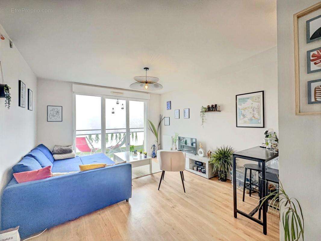 Appartement T2 idéal investisseur, bon DPE, balcon, place de parking exterieur - photo 7