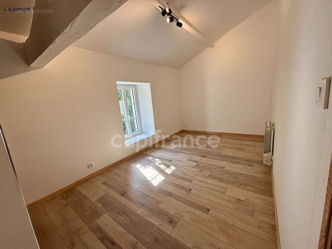 Maison avec deux logements indépendants : une opportunité rare pour habiter, investir ou réunir plusieurs générations - photo 6