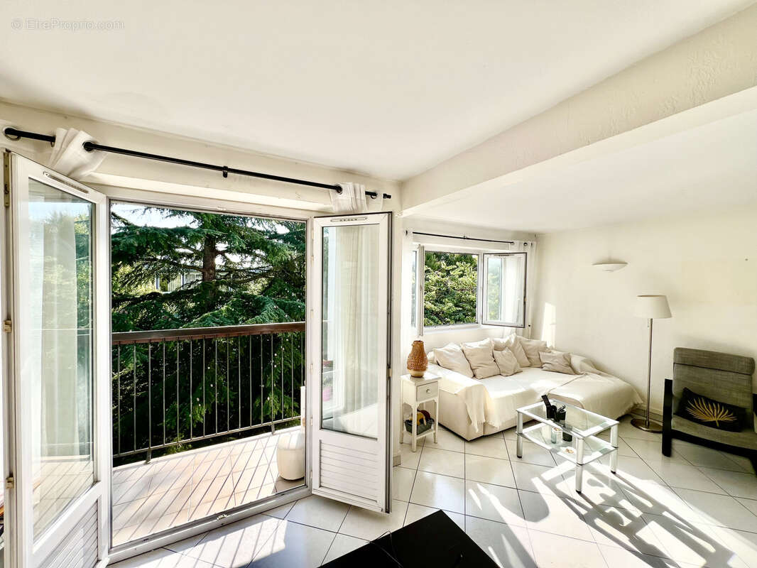 Appartement 88m2- dernier étage- balcon- cave - parking - photo 5