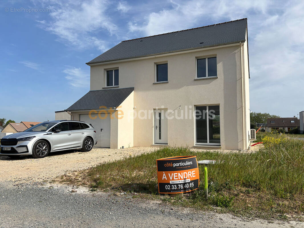 Maison à AGON-COUTAINVILLE