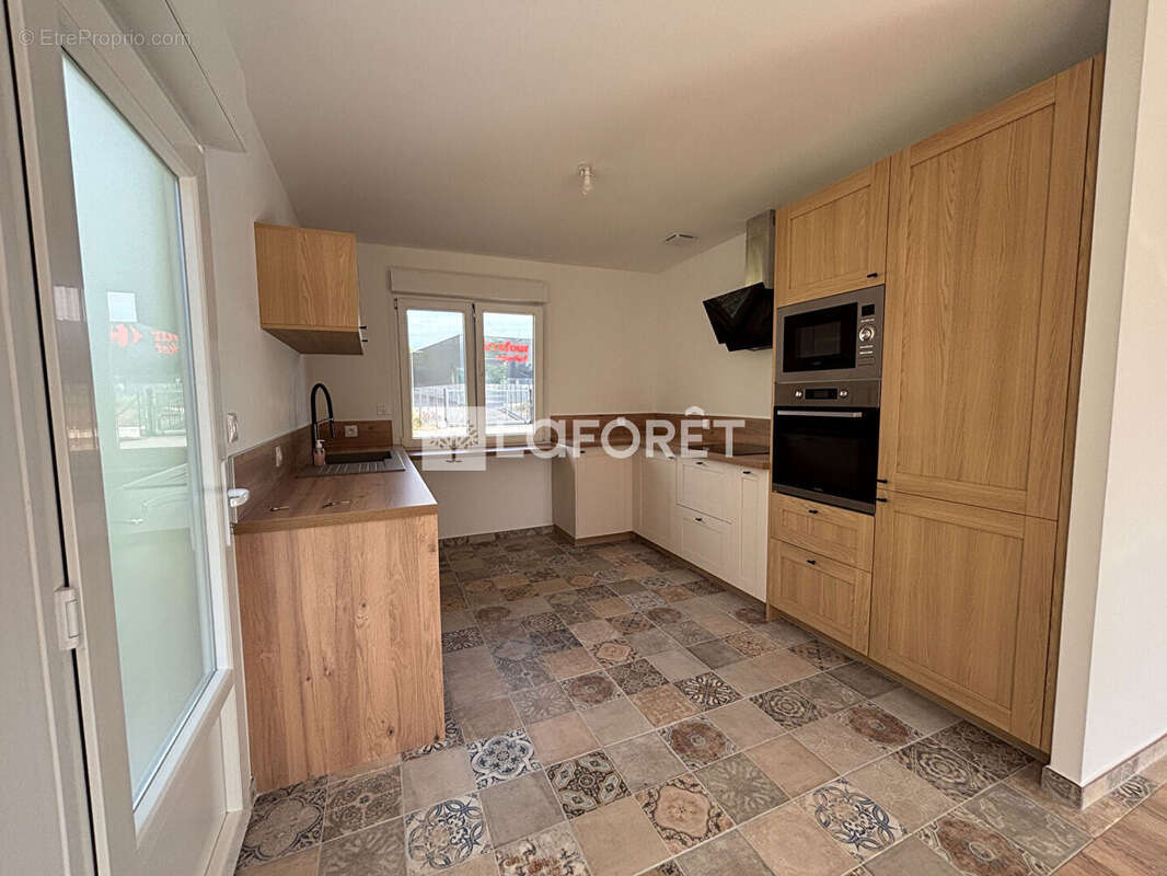 Plain pied individuel sur sous-sol complet avec grand jardin - photo 3