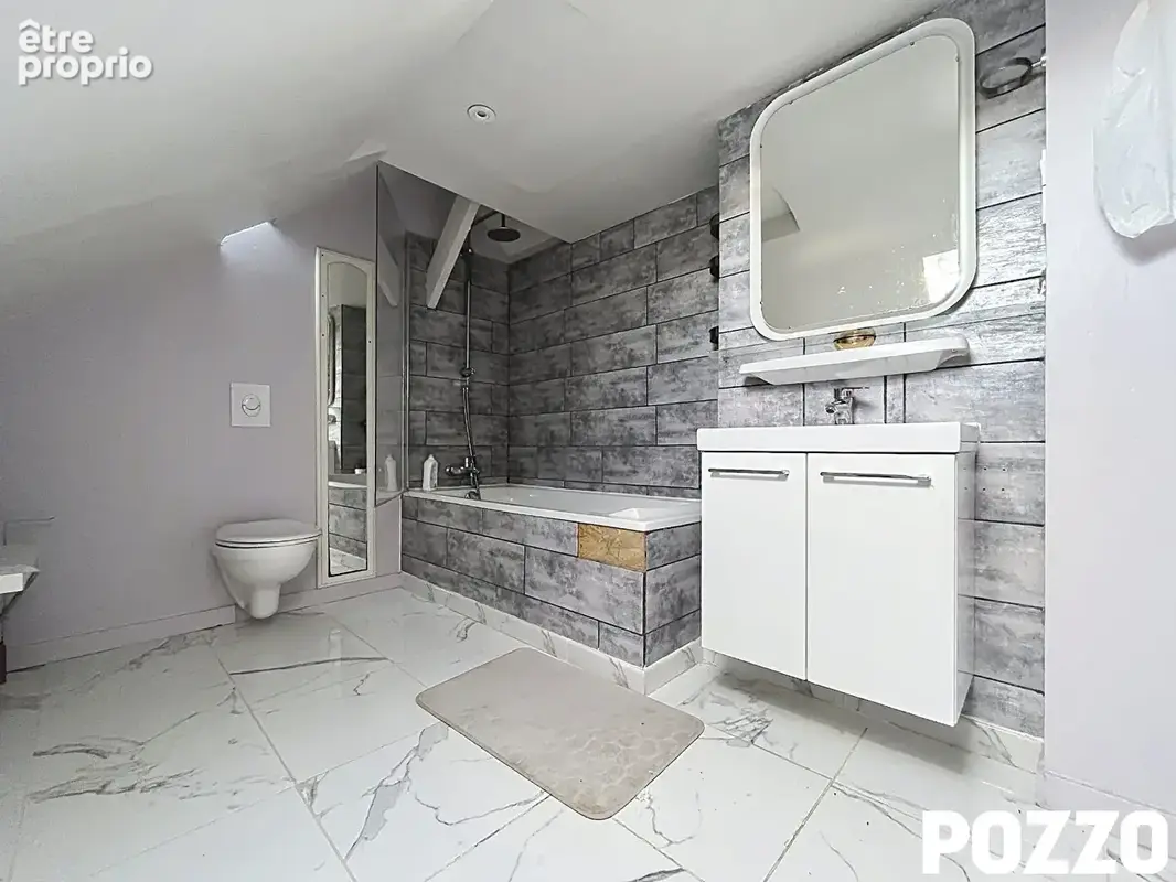 A Vendre - Pontorson - Maison sur sous-sol  6 pièce(s) 100 m² - photo 11