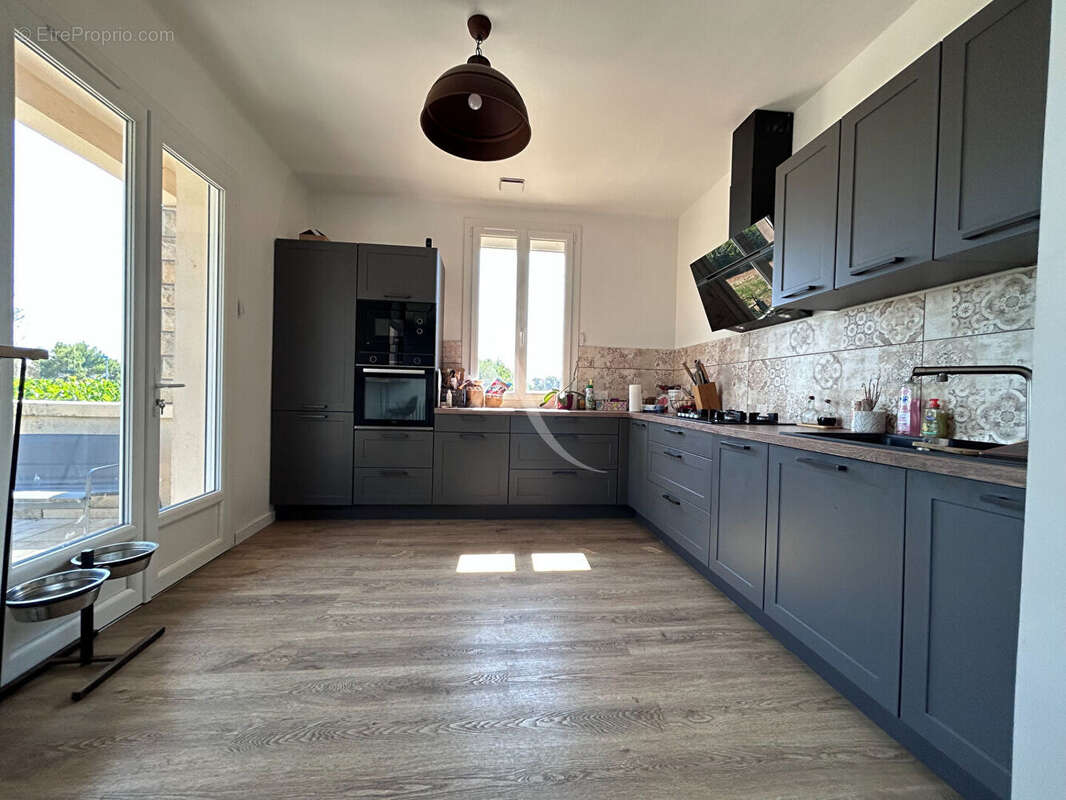 Maison rénovée avec jardin et sous-sol - photo 7