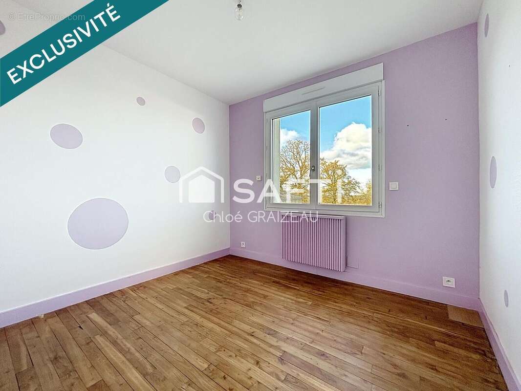 Photo 9 - Maison à LA CHAPELLE-SAINT-LAURENT