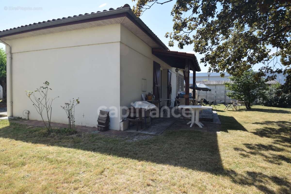 Maison de plain-pied - 4 chambres - garage - terrain clos - photo 17